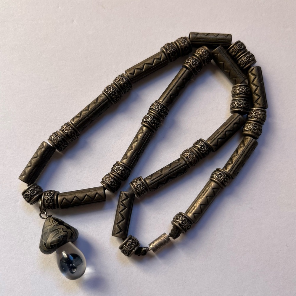 Unique metal beaded necklace with glass mushroom charm